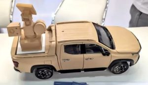 china pamerkan senjata laser portabel yang dipasang di mobil pickup aqn